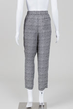 Load image into Gallery viewer, Theory black &amp; white patterned elasticized and tapered ankle length pants (M)
