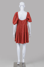 Load image into Gallery viewer, House of Harlow 1960 rust color tiered mini dress with smocked back (L)
