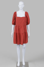 Load image into Gallery viewer, House of Harlow 1960 rust color tiered mini dress with smocked back (L)
