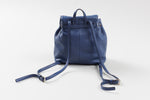 Load image into Gallery viewer, Kate Spade blue leather mini backpack with inside zippered pocket and leather drawstring closure

