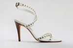 Load image into Gallery viewer, Manolo Blahnik creme strappy sandals with copper stud detailing (worn heel + 1 heel cap with crack)(39)
