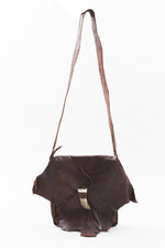 Load image into Gallery viewer, Hand Crafted leather messenger bag with horn detail.
