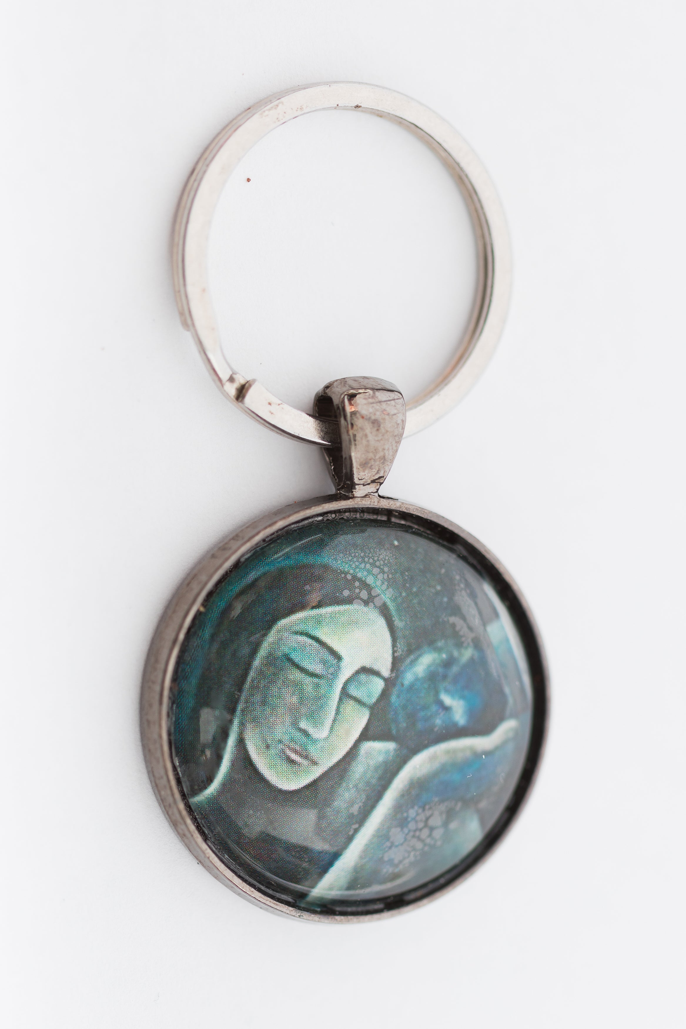 Mojgan Abolhassani Silver keychain with art