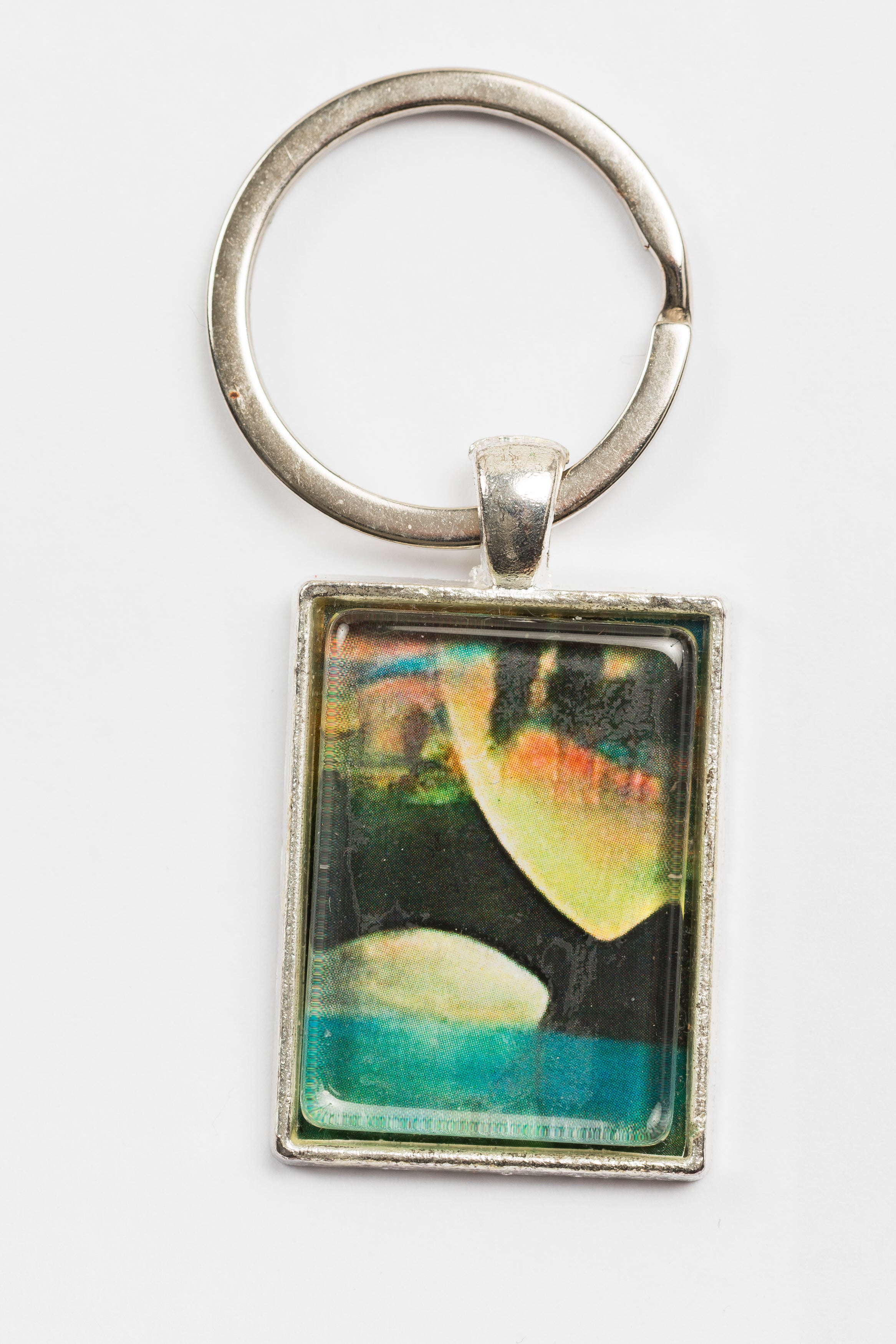 Mojgan Abolhassani Silver keychain with art
