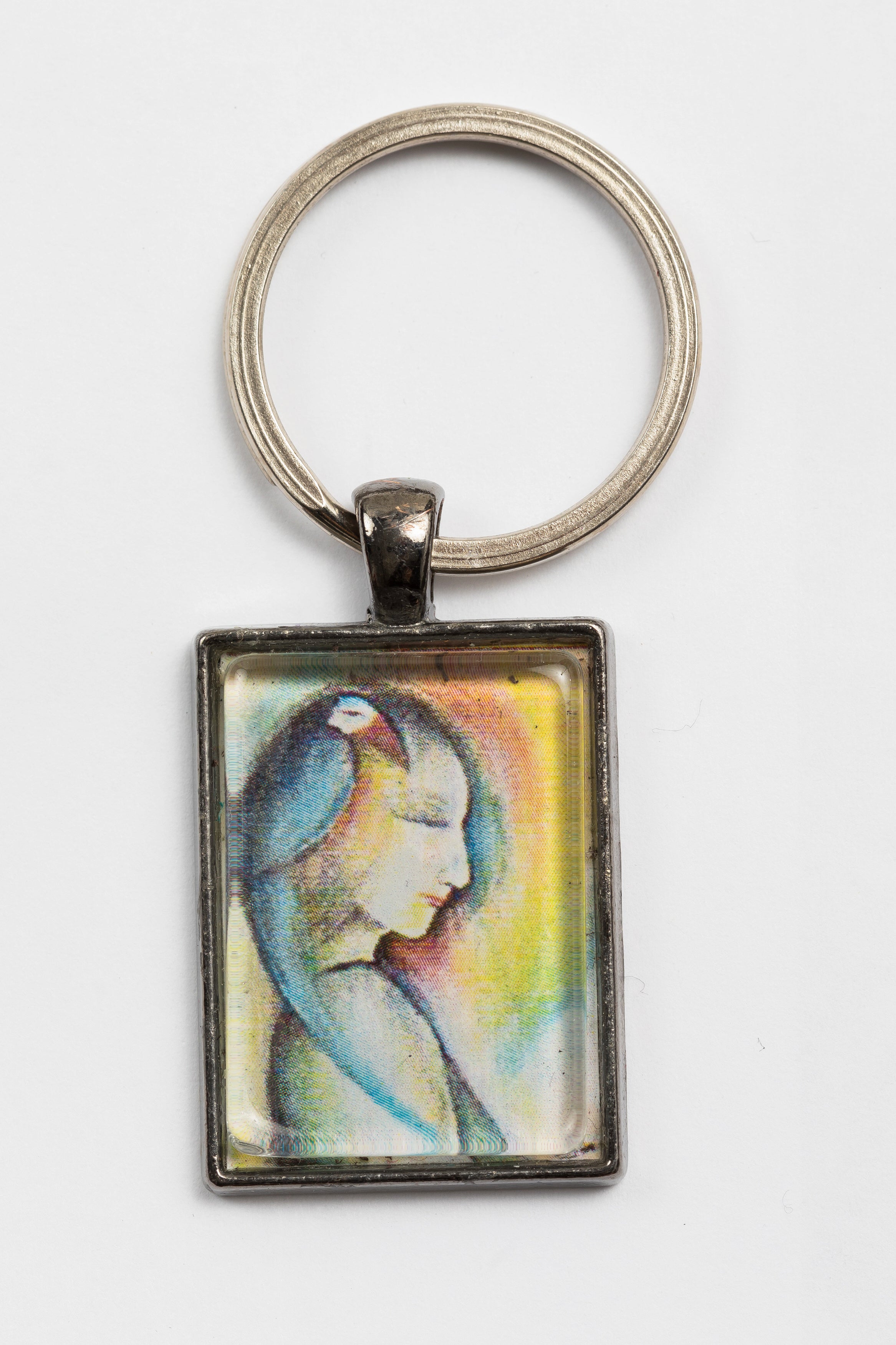 Mojgan Abolhassani Silver keychain with art