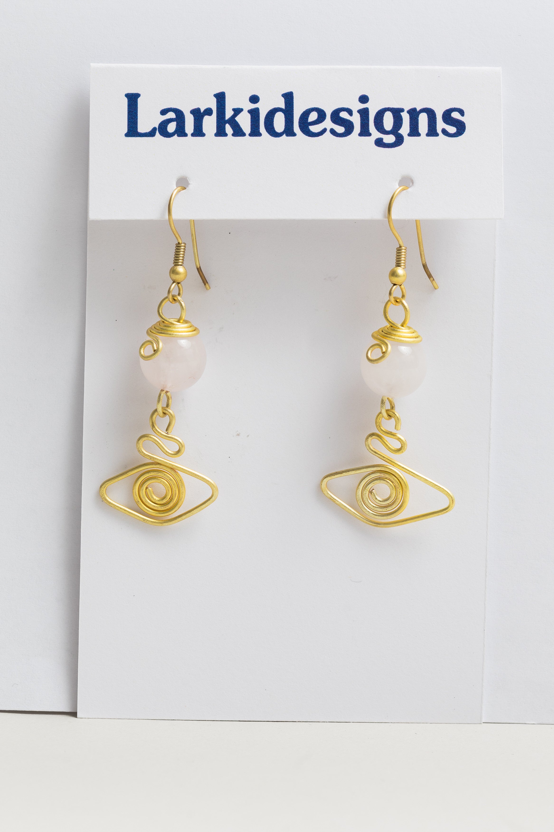 Larki Designs White gemstone with gold earrings
